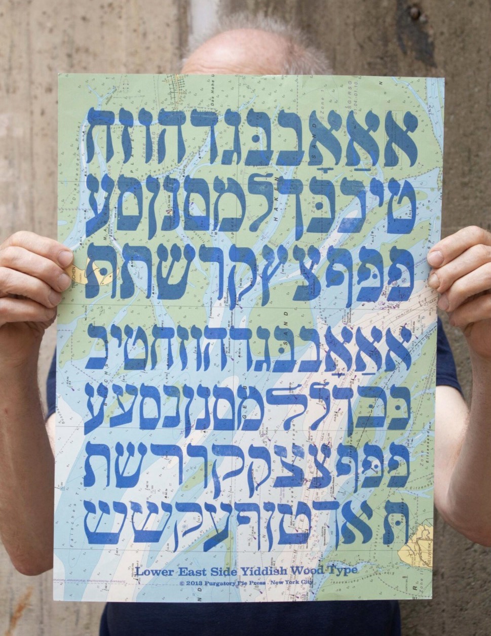 a map of the NYC lower east side with yiddish alphabet on top