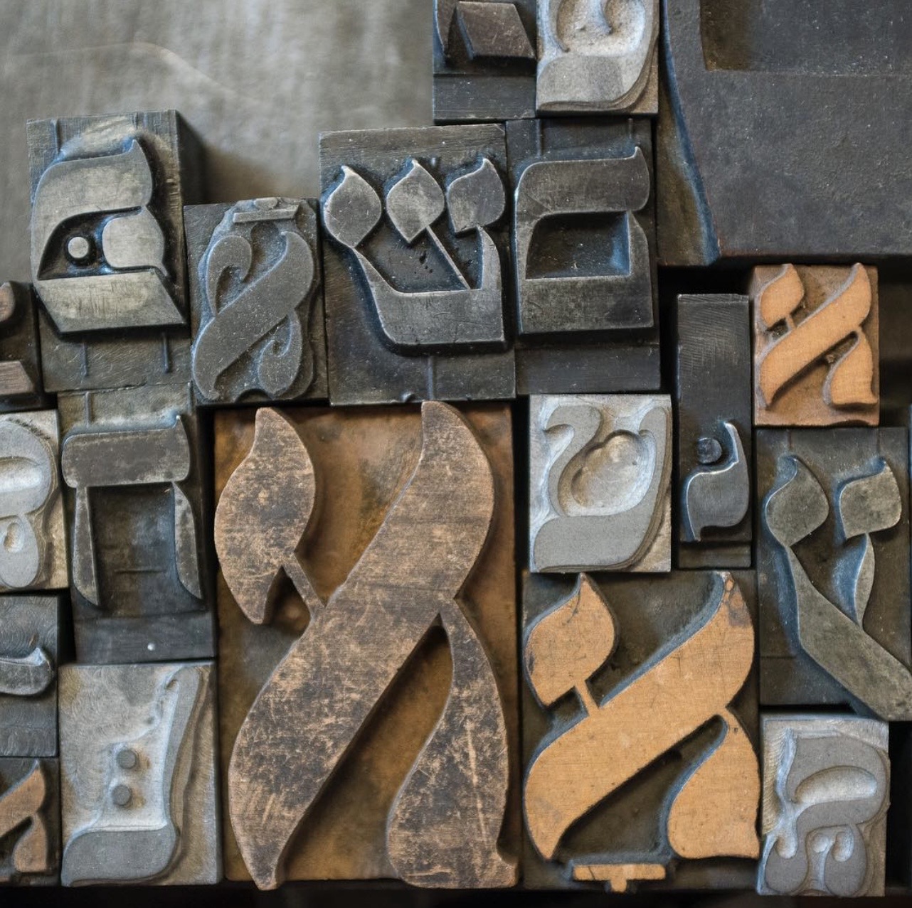 assorted size metal and wooden blocks